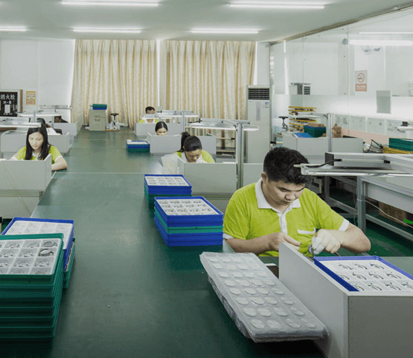 Workers-concentrating-on-watches-making